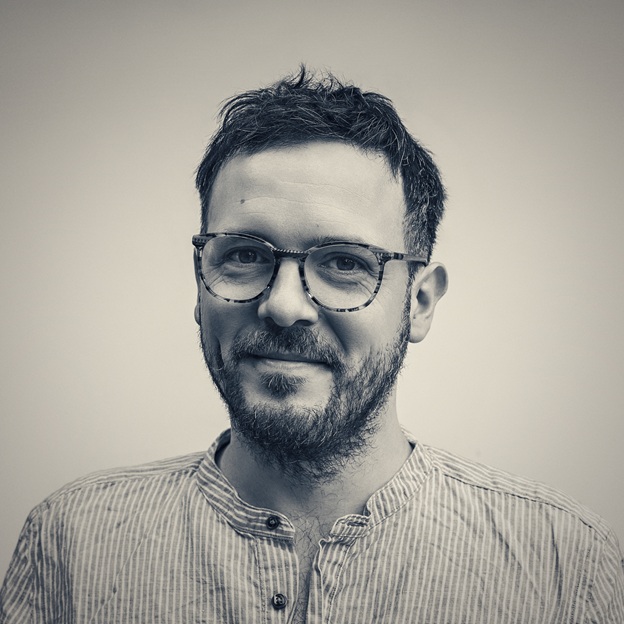Portraitfoto von Sascha Syndicus